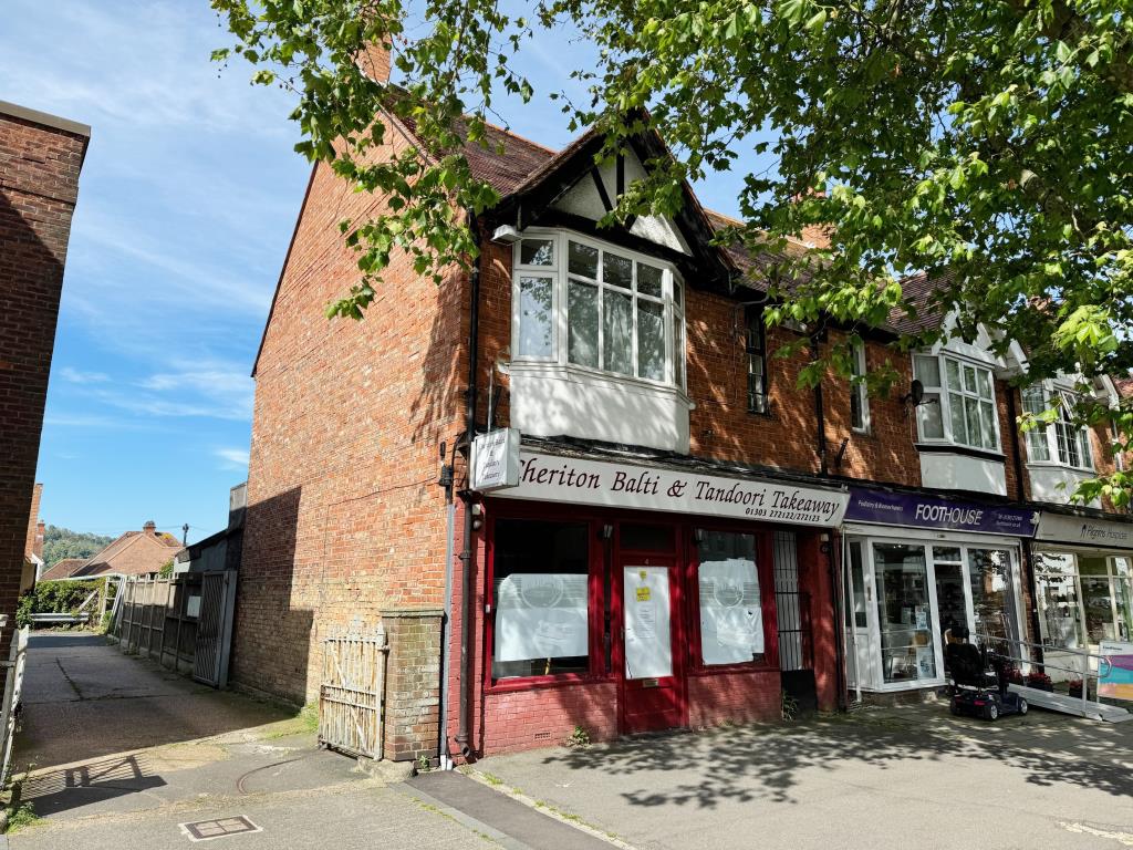 Lot: 164 - FREEHOLD HIGH STREET SHOP AND FLAT INVESTMENT - Front of property